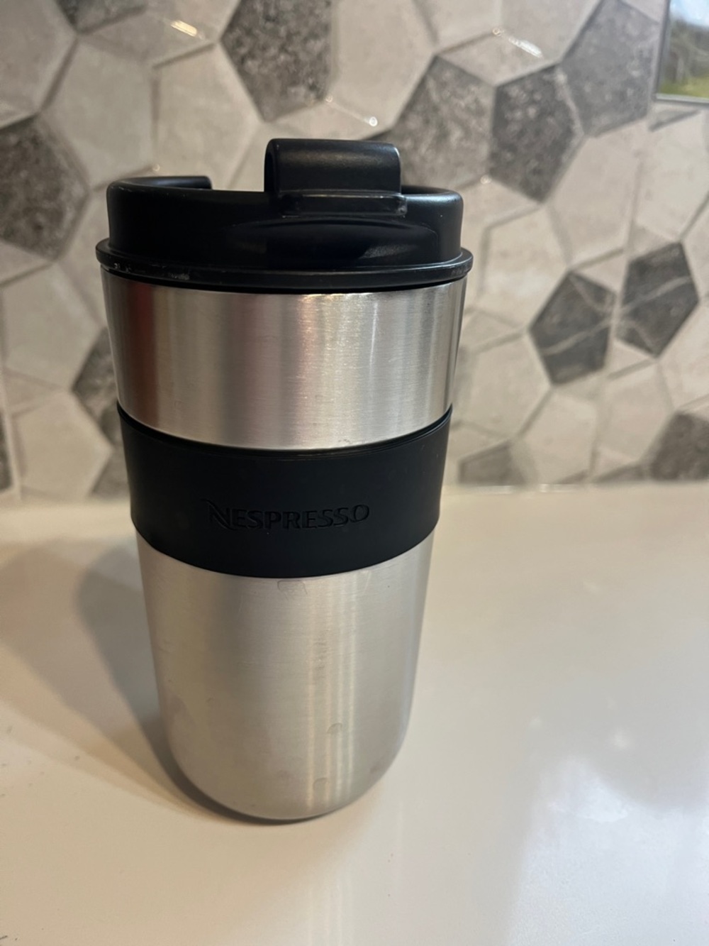 Nespresso Silver and Black Travel Tumbler with Silicone Grip